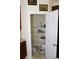 Walk-in pantry with shelving, adjacent to the kitchen at 1440 Gallup Dr, Stockbridge, GA 30281