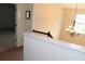 View of the staircase and upstairs hallway with chandelier at 1440 Gallup Dr, Stockbridge, GA 30281