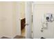 Walk-in closet featuring wire shelving, view into bathroom and other rooms at 1440 Gallup Dr, Stockbridge, GA 30281
