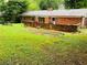 Picturesque backyard featuring a patio with space for gardening and relaxation at 3727 Dial Dr, Stone Mountain, GA 30083