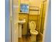 Bathroom with toilet, sink, and shower with bright tile at 3727 Dial Dr, Stone Mountain, GA 30083