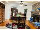 Dining room with wood table, brick fireplace, and tile floors at 3727 Dial Dr, Stone Mountain, GA 30083