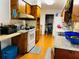 Traditional kitchen with wooden cabinets and tiled flooring at 3727 Dial Dr, Stone Mountain, GA 30083