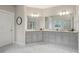 Bright bathroom features granite countertops and double vanity at 4402 Income Cir, Ellenwood, GA 30294