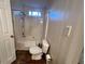 Bathroom with toilet, tub, and shower combination at 709 Kilkenny Cir, Lithonia, GA 30058