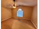 Spacious bedroom with neutral walls, carpet floors, and a ceiling fan with lighting at 709 Kilkenny Cir, Lithonia, GA 30058