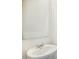Bathroom featuring sleek white vessel sink and large frameless mirror for a modern touch at 2771 Aralynn Way, College Park, GA 30337