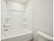 Bright, clean bathroom features a shower-tub combination with built-in shelving at 2771 Aralynn Way, College Park, GA 30337