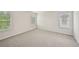 Spacious bedroom has neutral carpet, two windows and plenty of natural light at 2771 Aralynn Way, College Park, GA 30337