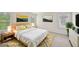 Bedroom boasts bright decor, two windows and staged with modern furniture at 2771 Aralynn Way, College Park, GA 30337
