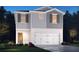 Charming two-story home featuring a brick and siding exterior, a two-car garage and manicured landscaping at 2771 Aralynn Way, College Park, GA 30337