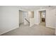 Spacious hallway with carpeted floor, staircase and open access to rooms creating a seamless flow at 2771 Aralynn Way, College Park, GA 30337