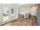 Open kitchen showing stainless steel appliances, island with sink, and view to the backyard at 2771 Aralynn Way, College Park, GA 30337