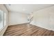 Bright living room with hardwood flooring, large windows, offering a view of the staircase and second story at 2771 Aralynn Way, College Park, GA 30337