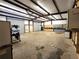 An open garage space with storage cabinets and shelving, perfect for a functional workspace at 300 Outlaw Rdg, Canton, GA 30115