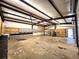 A spacious garage featuring an open layout and well-organized storage and working area at 300 Outlaw Rdg, Canton, GA 30115