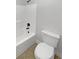 Simple bathroom with white fixtures and a shower/tub combo at 2910 Blake Towers Ln, Buford, GA 30519