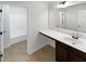 Bathroom featuring white countertops, a sink and large mirror at 2910 Blake Towers Ln, Buford, GA 30519