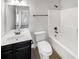 Bathroom features a single sink vanity, toilet, and shower-tub combination at 2910 Blake Towers Ln, Buford, GA 30519