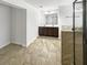 Bathroom featuring tiled flooring, double vanity, shower with glass door, and modern fixtures at 2910 Blake Towers Ln, Buford, GA 30519