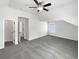 Bedroom with large closet and ceiling fan at 2910 Blake Towers Ln, Buford, GA 30519