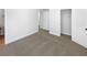 Carpeted bedroom features neutral walls and a closet at 2910 Blake Towers Ln, Buford, GA 30519