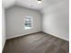 Bright bedroom with neutral carpet and a window providing natural light at 2910 Blake Towers Ln, Buford, GA 30519