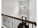 View from the staircase shows the entryway with natural light at 2910 Blake Towers Ln, Buford, GA 30519