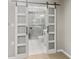 This spacious bathroom features modern sliding doors and a glass shower at 475 Mount Vernon Ne Hwy # 226C, Atlanta, GA 30328