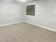 Empty bedroom with plush carpet and window with blinds, ready for your personal touch at 475 Mount Vernon Ne Hwy # 226C, Atlanta, GA 30328