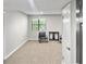 Bright bedroom features a window with natural light and plush carpet flooring at 475 Mount Vernon Ne Hwy # 226C, Atlanta, GA 30328