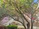 Scenic garden view showcasing mature trees and blooming flowers at 475 Mount Vernon Ne Hwy # 226C, Atlanta, GA 30328