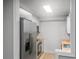 Modern kitchen with stainless steel refrigerator, wooden countertops, and white cabinets at 475 Mount Vernon Ne Hwy # 226C, Atlanta, GA 30328