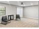 Spacious living room featuring plush carpet, neutral paint and sliding doors for natural lighting at 475 Mount Vernon Ne Hwy # 226C, Atlanta, GA 30328