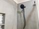 Modern shower with matte black fixtures, tile surround and glass door at 475 Mount Vernon Ne Hwy # 226C, Atlanta, GA 30328