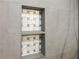 Close-up of a modern shower niche with stylish tile accents and convenient shelving at 475 Mount Vernon Ne Hwy # 226C, Atlanta, GA 30328