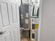 Efficient utility closet featuring a water heater and HVAC system for home comfort at 475 Mount Vernon Ne Hwy # 226C, Atlanta, GA 30328
