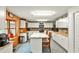 Spacious kitchen featuring a center island, white cabinetry, and tile flooring at 1791 Walker Sw Rd, Conyers, GA 30094