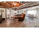 Finished basement living room features exposed duct work and wood-look floors at 1791 Walker Sw Rd, Conyers, GA 30094