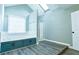 Bathroom with soaking tub, walk-in shower, and wood-look floors at 1810 Talbot Ct, Lawrenceville, GA 30044