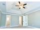 Bedroom with large closet doors and natural light at 1810 Talbot Ct, Lawrenceville, GA 30044