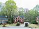 Front exterior view of the home showcasing the landscaped front yard and traditional architecture at 1810 Talbot Ct, Lawrenceville, GA 30044