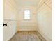 Walk-in closet with metal shelving and carpet at 1810 Talbot Ct, Lawrenceville, GA 30044