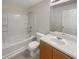 Clean bathroom featuring a soaking tub, modern fixtures, and ample storage space for a relaxing and functional experience at 7302 Par Four Way, Lithonia, GA 30038
