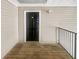 Welcoming entryway with a secure door and private balcony, offering convenience and a cozy outdoor space at 7302 Par Four Way, Lithonia, GA 30038