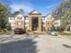 Attractive condo complex with a brick facade and well-maintained landscaping, ample parking, and easy access to amenities at 7302 Par Four Way, Lithonia, GA 30038