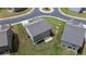 Overhead view of a home with a paved patio and manicured backyard at 485 Auburn Crossing Dr, Auburn, GA 30011