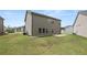 Large backyard with patio ideal for outdoor gatherings and relaxation at 485 Auburn Crossing Dr, Auburn, GA 30011