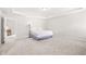 Spacious carpeted bedroom with tray ceiling offers a comfortable and relaxing retreat at 485 Auburn Crossing Dr, Auburn, GA 30011