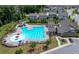 Aerial view of a community pool, clubhouse and play area at 485 Auburn Crossing Dr, Auburn, GA 30011